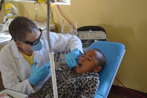 Giving local anaesthetic for surgery (freezing)